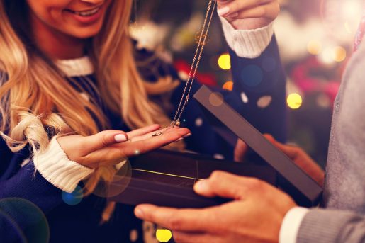 Woman opening present.