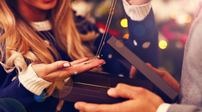 Woman opening present.