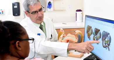 Dr. William Fisher with patient.