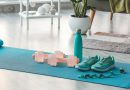 Sports equipment on yoga mat at home