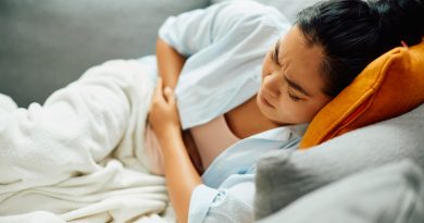 Young woman in pain.