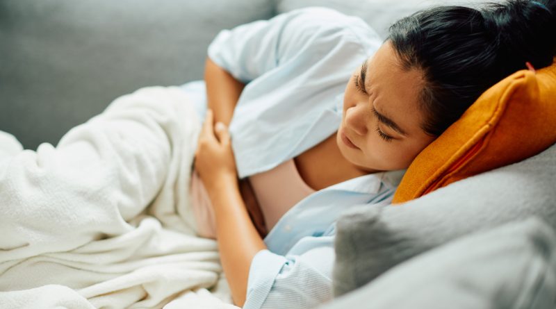 Young woman in pain.