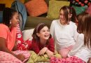 Group of happy young girls at a sleepover