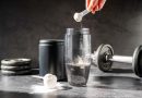 Creatine powder in a measuring scoop.