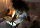 Child using tablet.