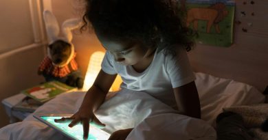Child using tablet.