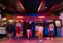 Teenagers at arcade.