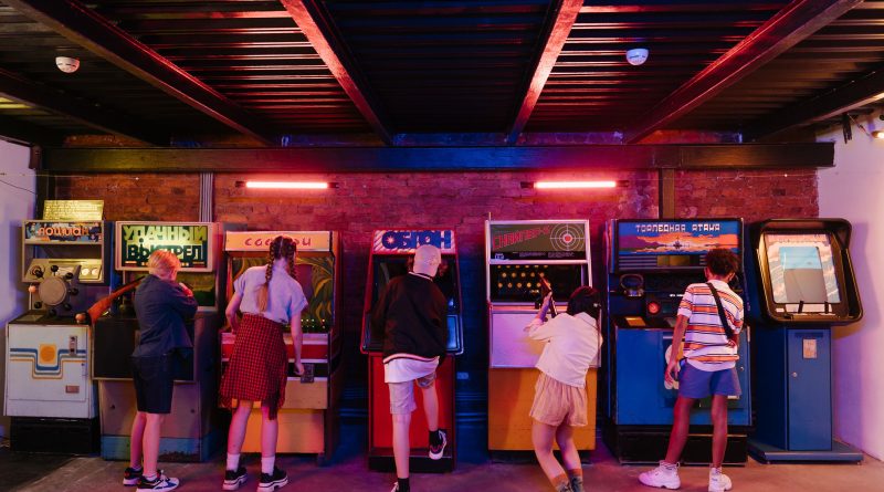 Teenagers at arcade.