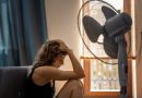 Does seasonal affective disorder exist in the summer? Woman sitting under fan.
