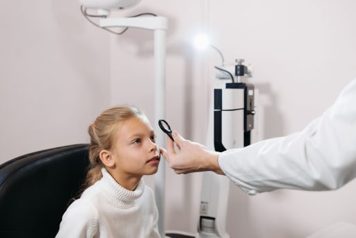 Child getting eye exam.