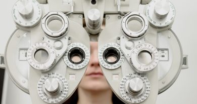 Person undergoing eye exam.